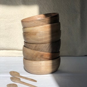 Handcrafted tableware in natural walnut wood