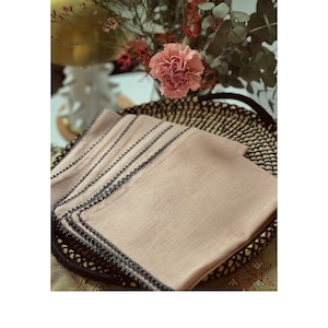 Table set in hand-embroidered linen, exceptional quality.