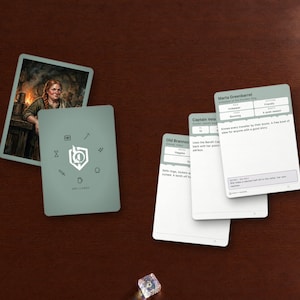 May include: A set of rectangular game cards featuring character profiles and illustrations. One card shows a woman in a tavern, while others display text like Marta Greenbarrel, Captain Vela, and Old Brannock. A gold pen and three polyhedral dice are nearby.