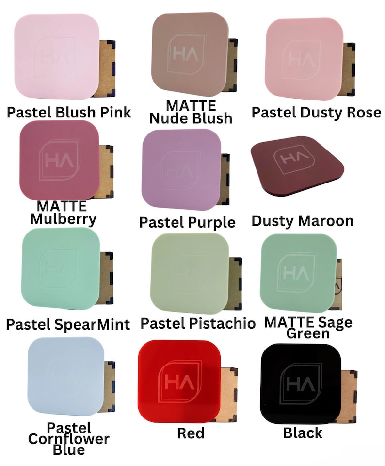 May include: A collection of 12 square matte nail polish colors, including pastel blush pink, nude blush, pastel dusty rose, matte mulberry, pastel purple, dusty maroon, pastel spearmint, pastel pistachio, matte sage green, pastel cornflower blue, red, and black.