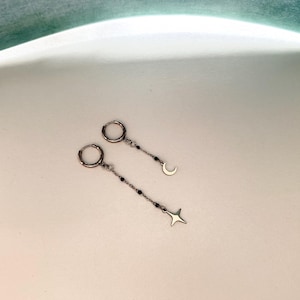 Unisex Stainless steel mismatched moon and star earrings on huggie hoops/Goth jewellery/Goth earrings/grunge/Biker earrings /Gifts for goths