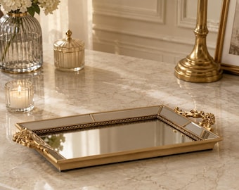 Bandeja de vaidade espelhada dourada: decoração com puxador ornamentado em resina.