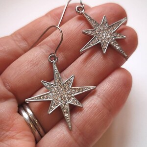 Silver star earrings - sparkly starburst earrings - stainless steel hook - party earrings - Christmas earrings - gift for her