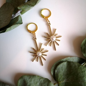 Starburst earrings // available in gold or silver colour- huggie star earrings- small sunburst hoops- accessories for her- stocking filler