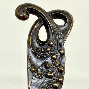 Acessório de mesa Art Nouveau Bronze Abridor de cartas Decoração Lírio do Vale por R Heyner França Raro e incomum
