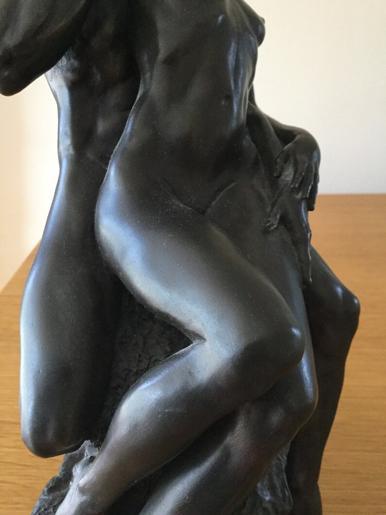 Sculpture of a Naked Couple Embracing on a Rock base. Foundry image 3