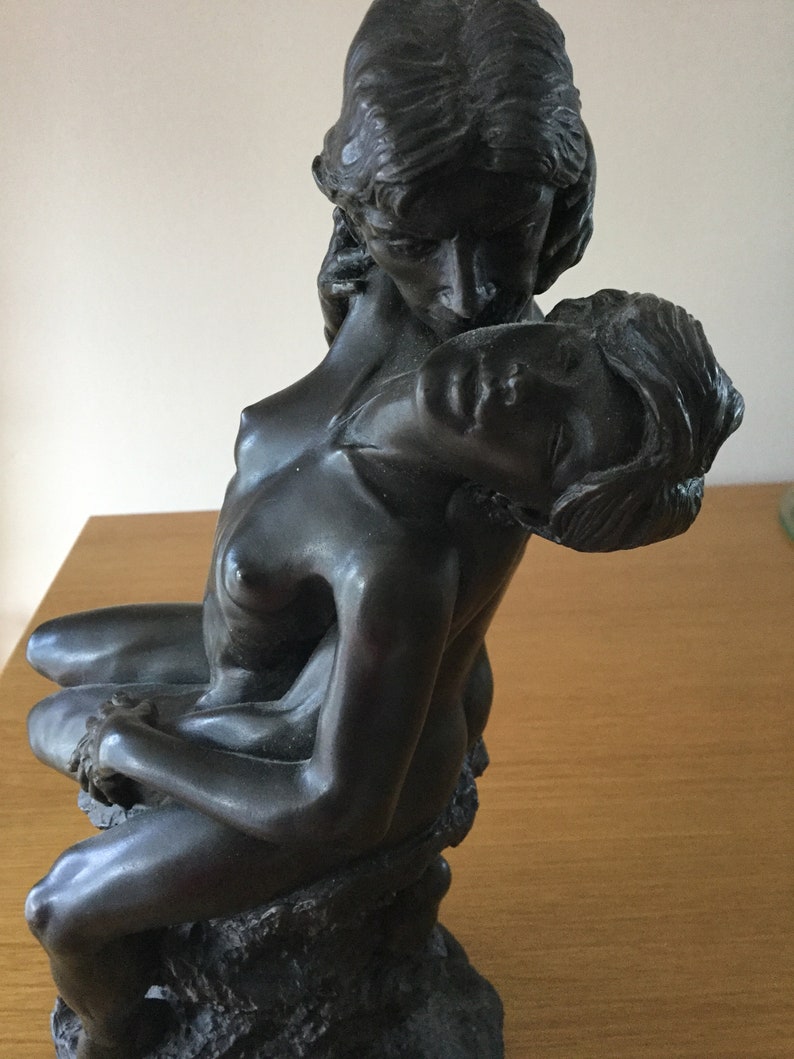 Sculpture of a Naked Couple Embracing on a Rock base. Foundry image 4