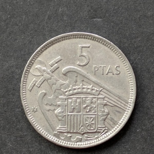 Spanish 5-peseta coins from 1957 with Francisco Franco