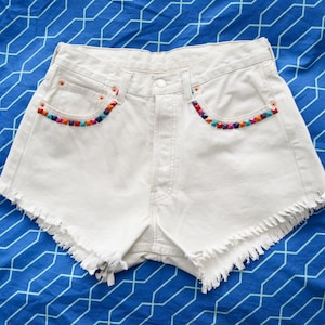 pantaloncini Levi, levis bianchi, pantaloncini bianchi, pantaloncini levis vintage, levis alti, pantaloni levis, levis