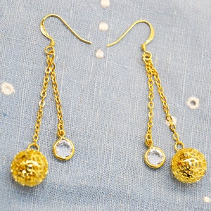 pendientes largos,pendientes dorados,pendientes de cadena,pendientes vendimia,pendientes de fiesta,pendientes de mujer,pendientes brillantes