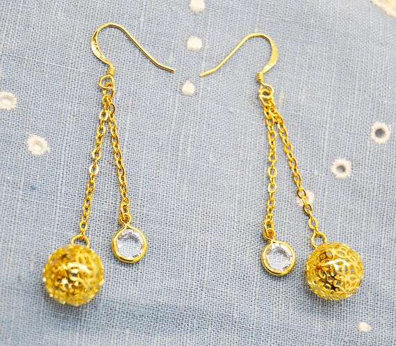 pendientes largos,pendientes dorados,pendientes de cadena,pendientes vendimia,pendientes de fiesta,pendientes de mujer,pendientes brillantes