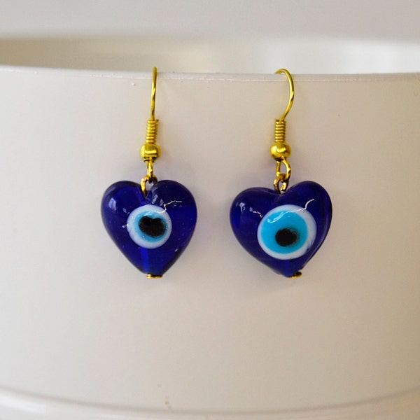 ojo protector,pendientes  azules,pendientes colgantes,pendientes corazon azul,pendientes de abalorios,pendientes de mujer,pendientes dorados