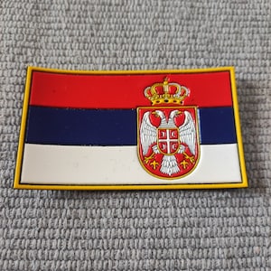 Serbian flag with coat of arms, laminated for your clothing or equipment.
