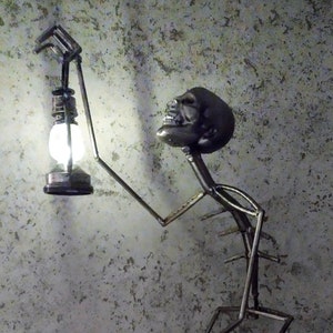 Skeleton, floor lamp, skeleton, stand, metal skeleton with LED lamp, skeleton lamp, height 70 cm, dwarf with lamp.