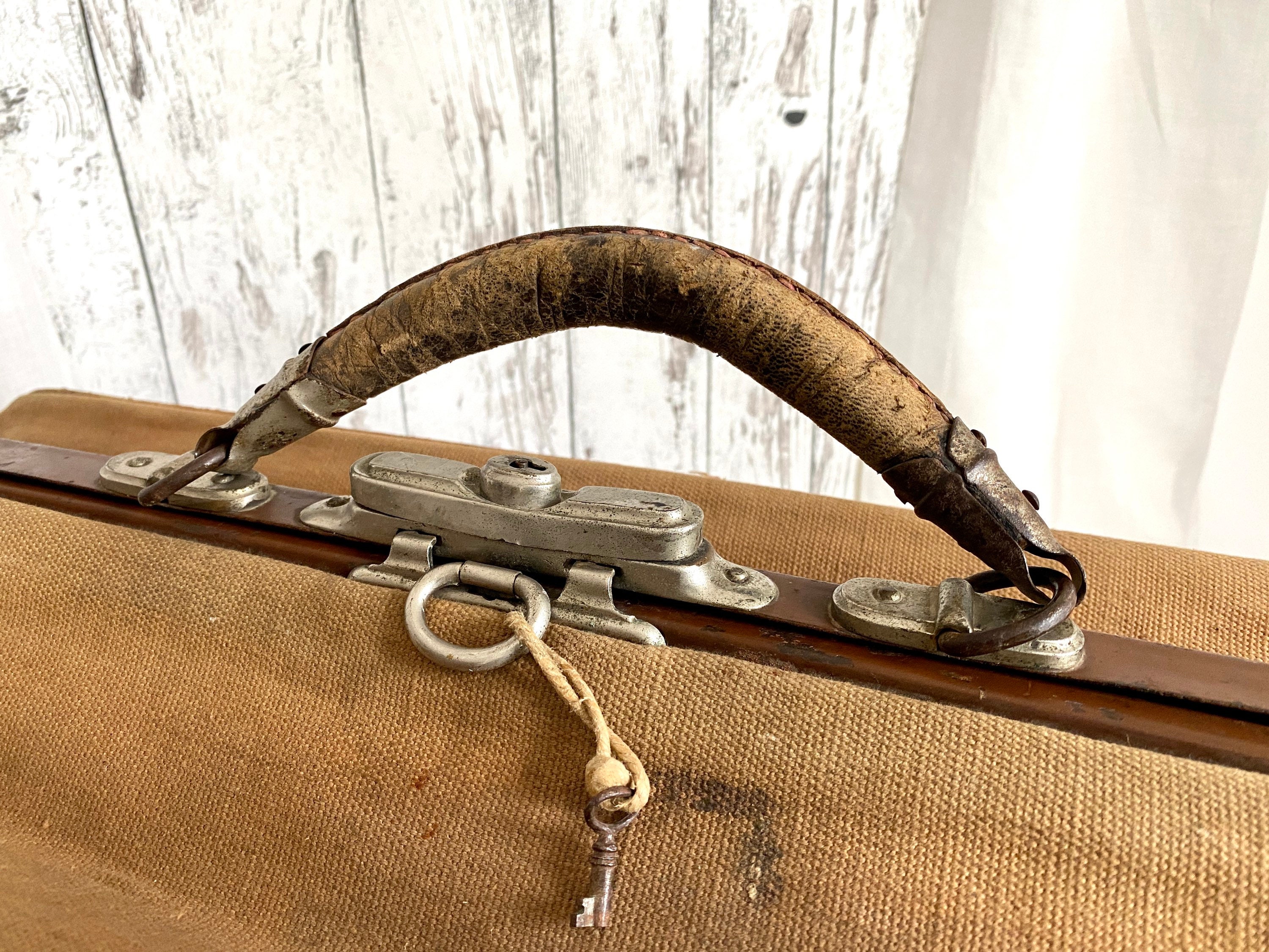 Mid 1800s traveling bag / valise. Hand finished buttonholes and trim. Brown  linen, cotton canvas trim.