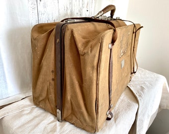 Mid 1800s traveling bag / valise. Hand finished buttonholes and trim. Brown  linen, cotton canvas trim.