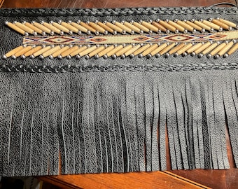fork wraps with fringe, black beads and bones