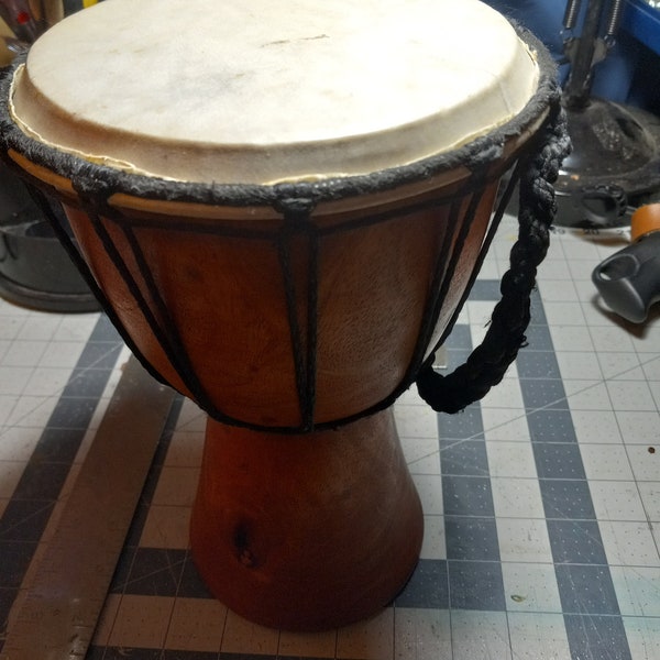 Wood and skin Djembe hand drum