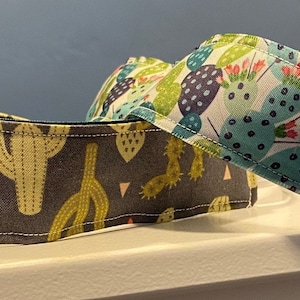 Cactus Non Slip Running Headband ya sea tela o cinta, diferentes tipos de cactus con flores