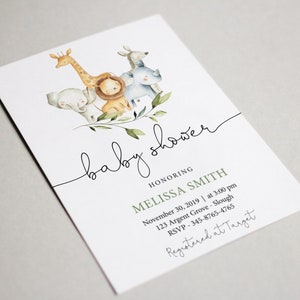 May include: A baby shower invitation with a watercolor illustration of a giraffe, lion, elephant, and rhinoceros surrounded by green leaves. The text reads "baby shower" and "honoring Melissa Smith". The date, time, location, RSVP information, and registry information are also included.