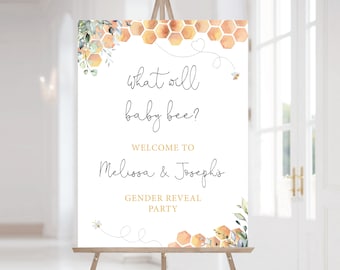 May include: A gender reveal party sign with a honeycomb and floral design. The sign says "What will baby bee?" and "Welcome to Melissa & Joseph's Gender Reveal Party".
