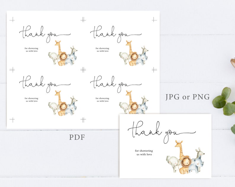 May include: Four printable thank you cards with a safari animal theme. The cards feature a giraffe, lion, zebra, and elephant with the text "Thank you for showering us with love".