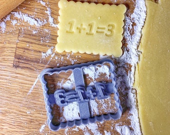 Emporte-pièce biscuits 1+1=3