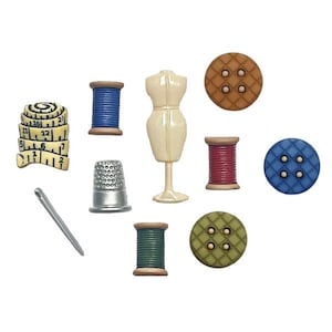 May include: A set of nine sewing-themed buttons featuring a variety of colors and designs, including a thimble, a spool of thread, a measuring tape, and a dress form.