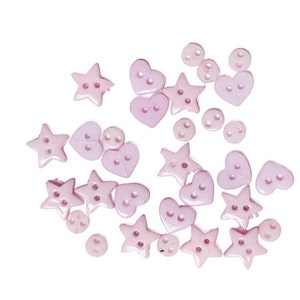 May include: A collection of pink heart and star shaped buttons.