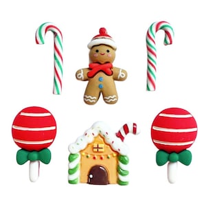 May include: A set of six Christmas-themed decorations, including a gingerbread man, two candy canes, two lollipops, and a gingerbread house. The decorations are made of colorful plastic and are perfect for adding a festive touch to any craft project.