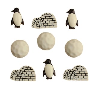 May include: A set of 8 penguin and igloo themed buttons. The buttons are white with black details. There are two penguins, two igloos, and four snowballs.
