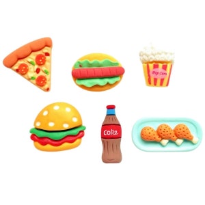 May include: A set of seven colorful, miniature food-themed figurines. The set includes a pizza slice, a hot dog, a burger, a bottle of soda labeled "Coke", a plate of fried chicken, a popcorn bucket, and a plate of fried chicken.