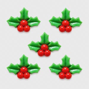 May include: Five identical holly leaf and berry embellishments arranged in a pentagon pattern. Each piece features three bright green, pointed leaves and three glossy, round red berries clustered in the center of the foliage.