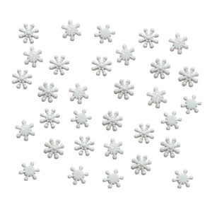 May include: A collection of small, white snowflake-shaped embellishments with glitter accents. These decorative elements are scattered across a white background, creating a wintery or festive aesthetic. Ideal for craft projects or holiday decorations.