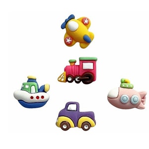 May include: A collection of colorful toy vehicles, including a yellow airplane, a red train, a green and white boat, a purple truck, and a pink submarine. Each vehicle is designed with cartoonish features and bright colors, perfect for children's crafts or decorations.