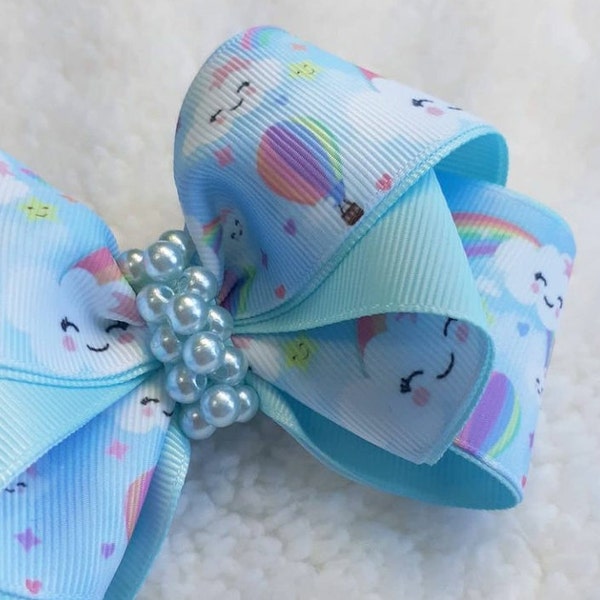 Beautiful bow with pattern of loving clouds!(with pearls in the center)