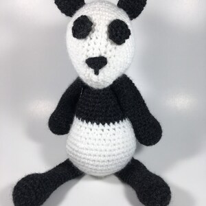 Crocheted stuffed panda bear with customized story card