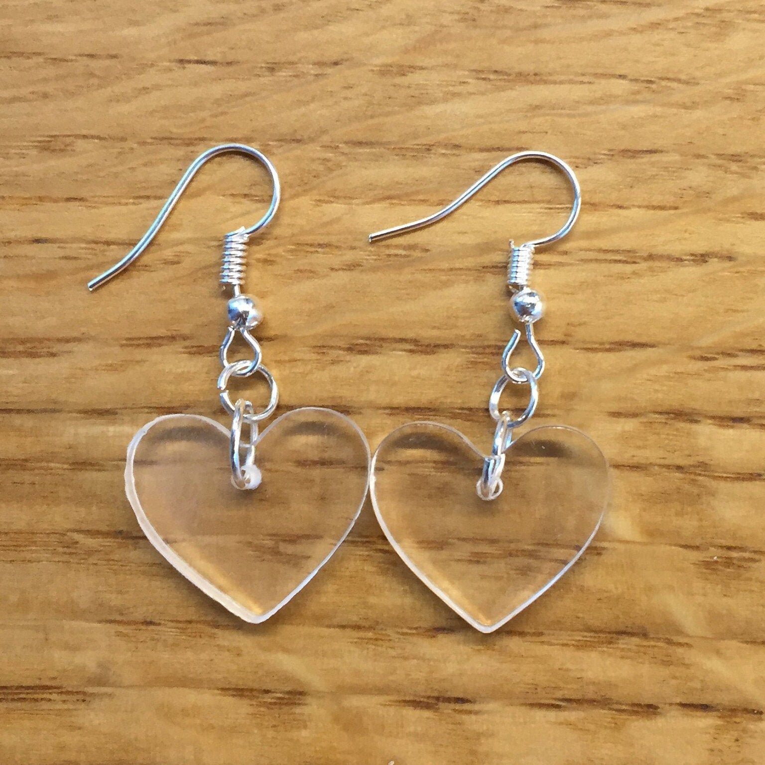 Clear heart earrings deals