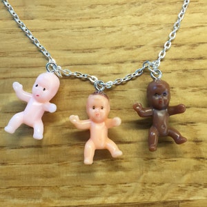 Multi-cultural cute baby doll necklace