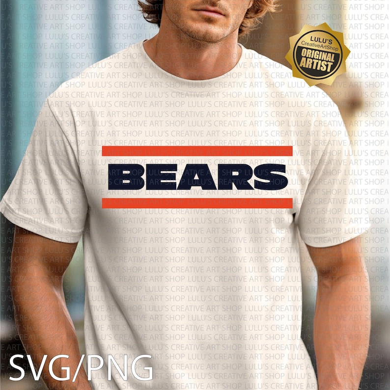 May include: White t-shirt featuring the word "BEARS" in navy blue block letters, with orange stripes above and below. The shirt has a crew neck and short sleeves. A gold "Original Artist" seal is in the upper right corner.
