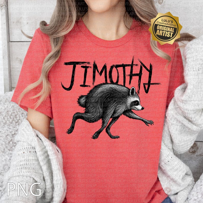 May include: A heathered red short-sleeve t-shirt featuring a black graphic illustration of a raccoon in a running pose. Above the raccoon, the text JIMOTHY is printed in a bold, distressed black font. A gold-colored badge is in the top right corner.