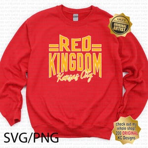 May include: Red sweatshirt with the text "=RED= KINGDOM Kansas City" in yellow lettering.
