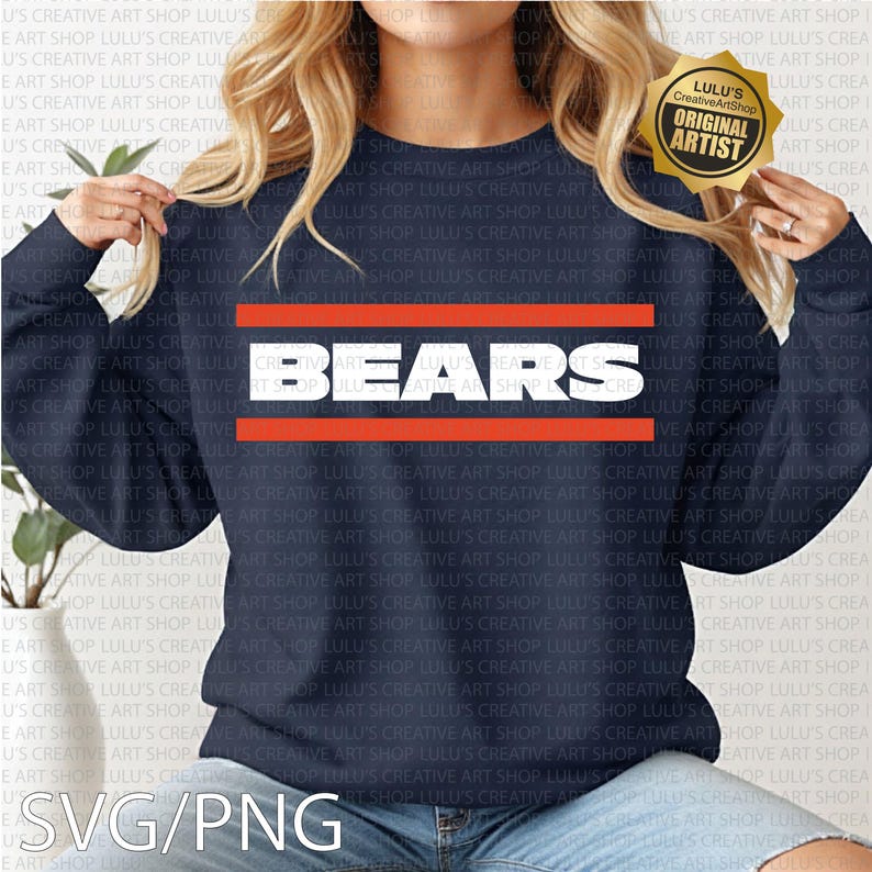 May include: Navy blue sweatshirt featuring the word "BEARS" in white block letters, framed by two horizontal orange stripes. The sweatshirt is a crew neck style and is made of a soft material.