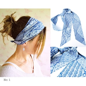 May include: A blue and white patterned headband and matching scarf. The headband is tied at the back of the head, and the scarf is displayed in two different ways. The pattern includes geometric and floral designs. The text "No: 1" is visible.