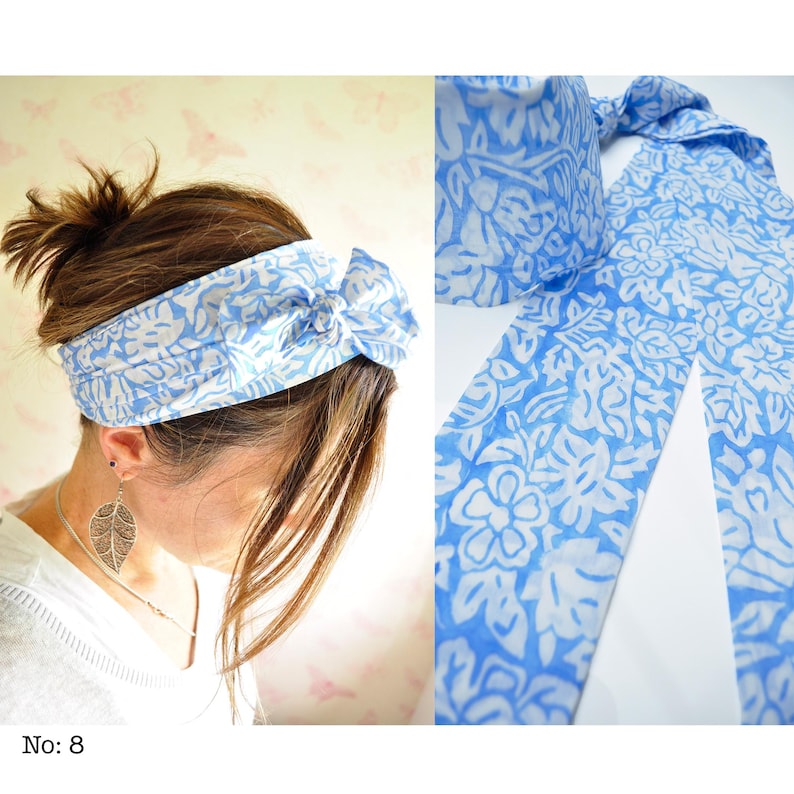 May include: A blue and white floral patterned headband with a bow detail. The headband is worn on a person's head. A matching scarf is also visible, featuring the same floral design. The text "No: 8" is in the bottom left corner.