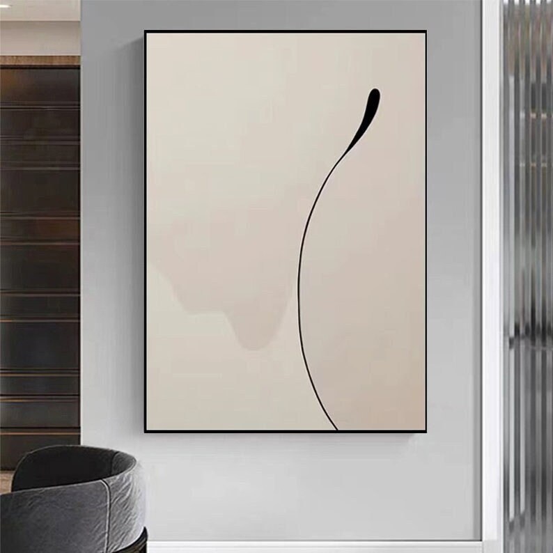 Puede incluir: Impresi&oacute;n de arte abstracto con una sola l&iacute;nea negra que se curva sobre un fondo beige claro.