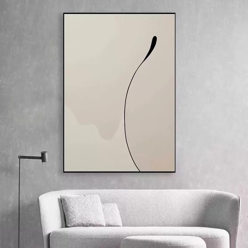 Puede incluir: Impresi&oacute;n de arte abstracto con una sola l&iacute;nea negra que se curva sobre un fondo beige claro.