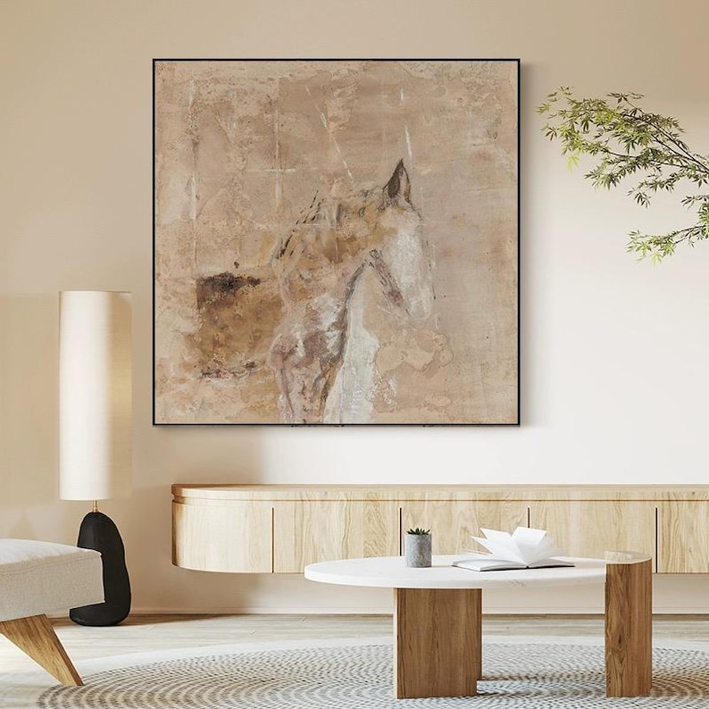 May include: Abstract painting of a horse's head in shades of brown and white on a beige background.