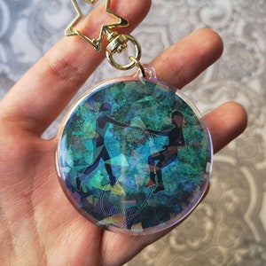 LAST UNIT SALE - Motherland: Fort Salem - Holographic keychain. Raelle Collar, Scylla Ramshorn, Raylla. Save scene.