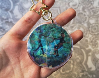 LAST UNIT SALE - Motherland: Fort Salem - Holographic keychain. Raelle Collar, Scylla Ramshorn, Raylla. Save scene.